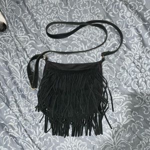 Black fringe crossover purse- worn many times but good condition.